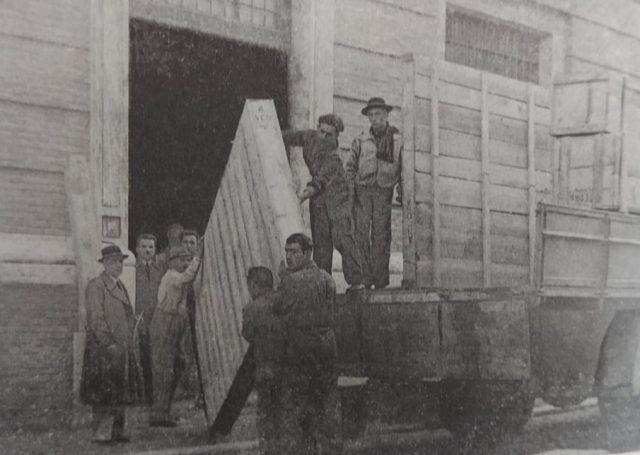 Crates containing national artistic heritage being transported to the entry of the Vatican depot

