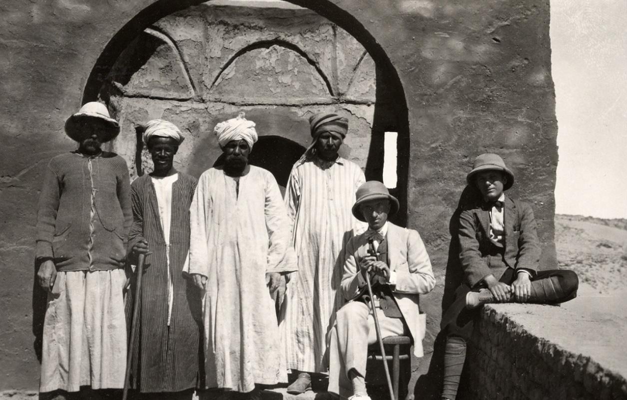 Ugo Monneret de Villard, architect F. Reggioni and four locals visiting the Monastery of San Simeone near the village of Gharbi El-Assuan, Egypt
