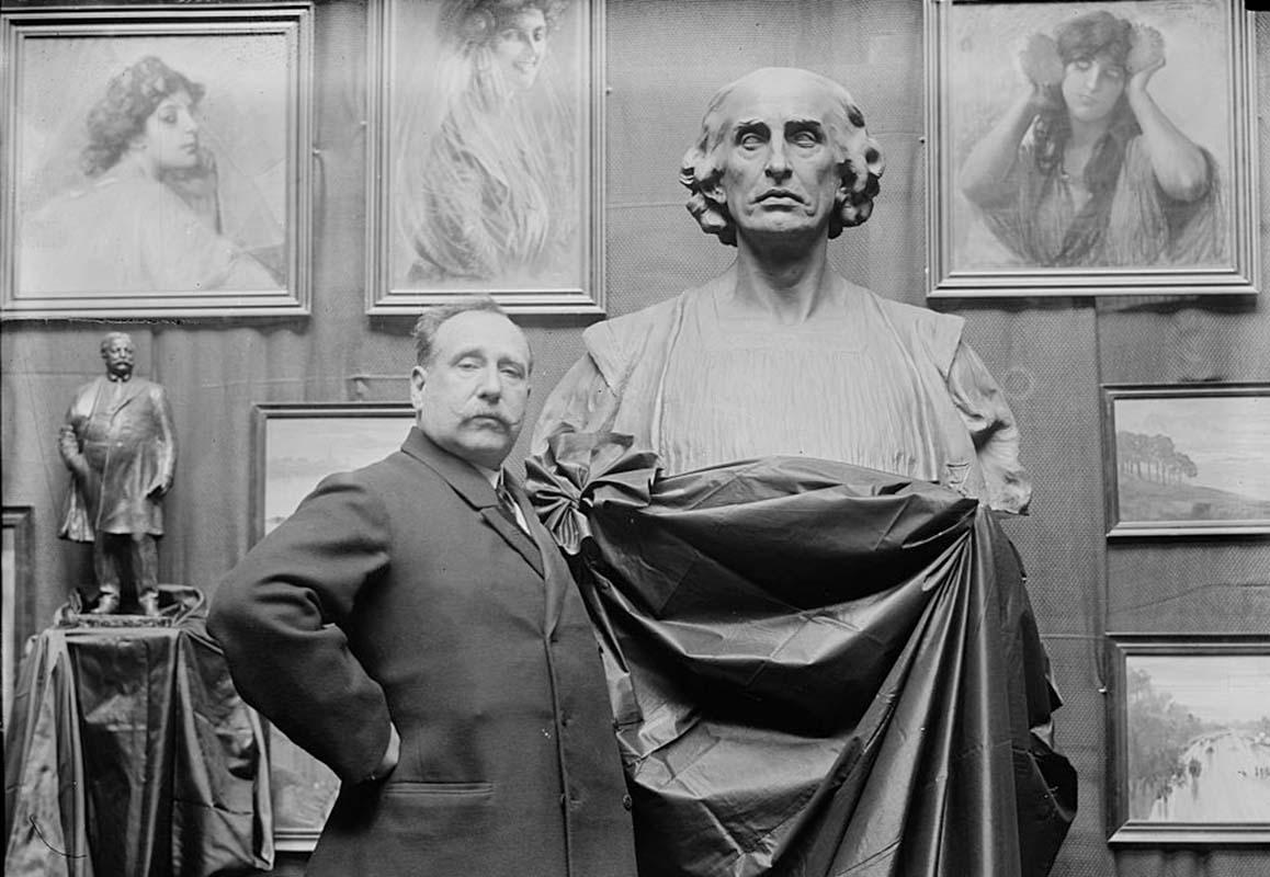 The sculptor Ettore Ximenes posing in his studio
